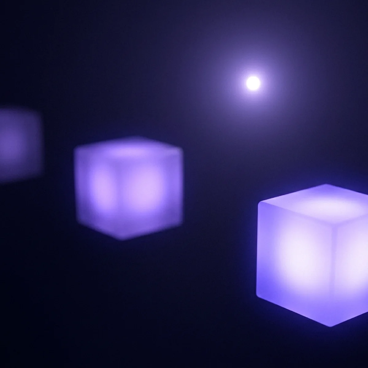 Three softly glowing data blocks at different distances in a dark room, representing three independent backup copies